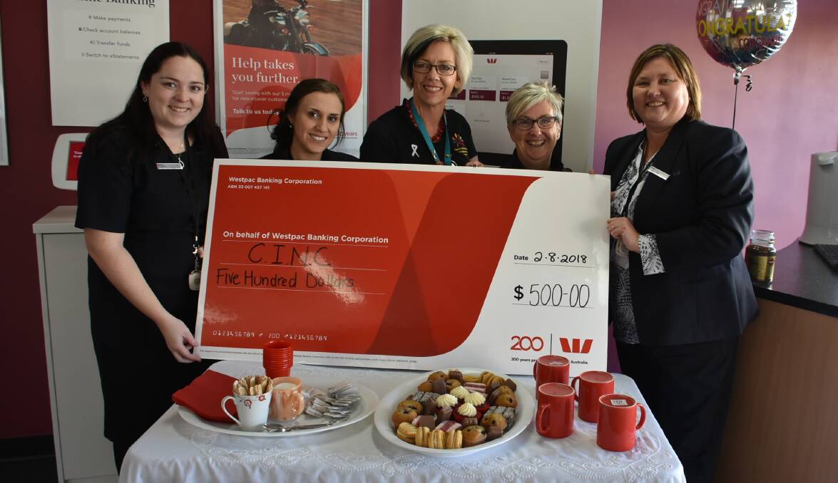 Westpac Cowra branch team members Sophie Butler and Chloe Thompson, CINC CEO Fran Stead, CINC's Marion Speechley and bank manager Fiona Chew.