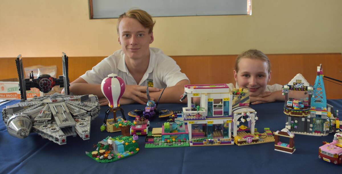 Ethan and Charlotte Tindall with a tiny fraction of the pieces that will be on display this Saturday.