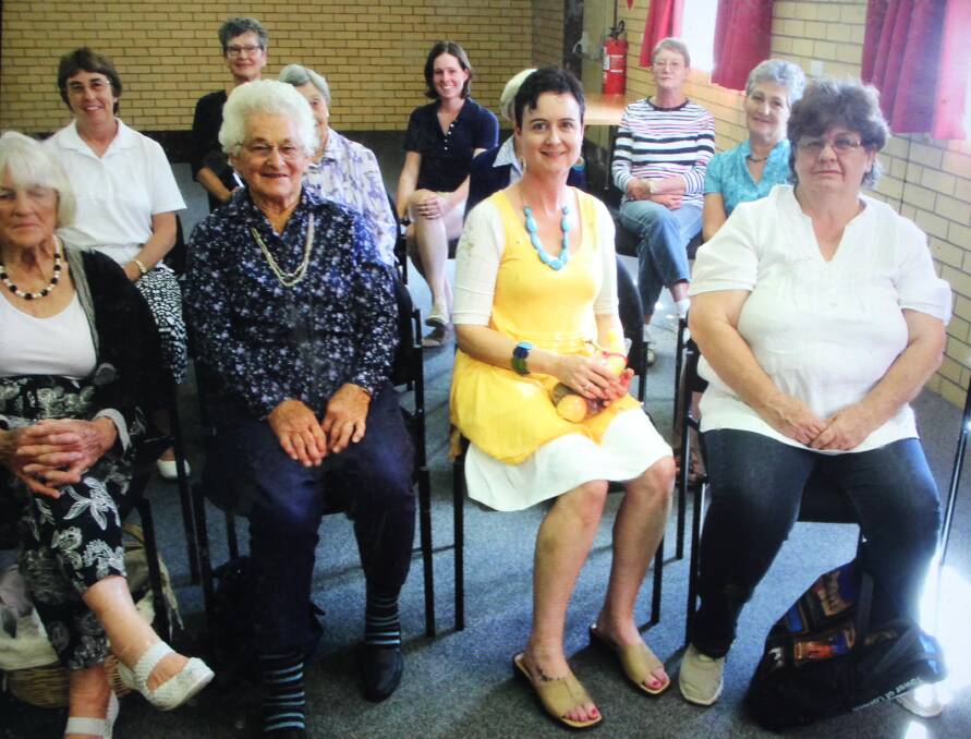 Guest speaker Rachel Kriss sitting with some Morongla CWA members at the Morongla Hall.
