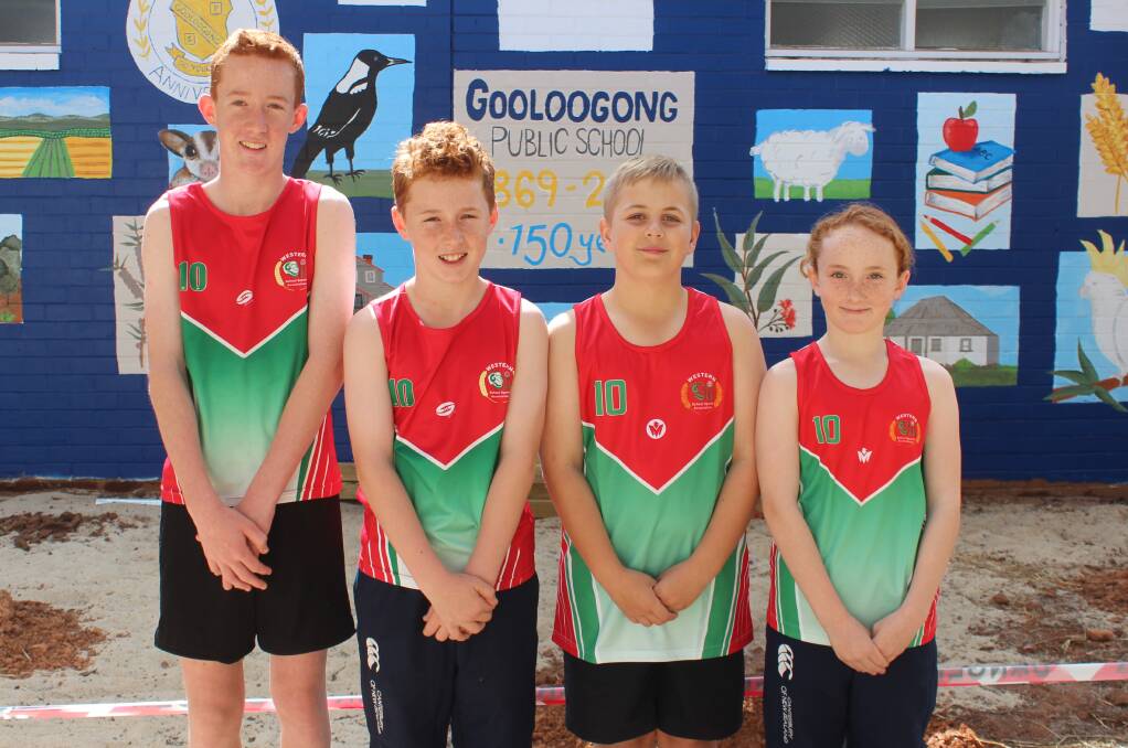Archie McDonald, Harry McDonald, Tommy Williams and Grace McDonald try on their uniform before heading to Sydney.