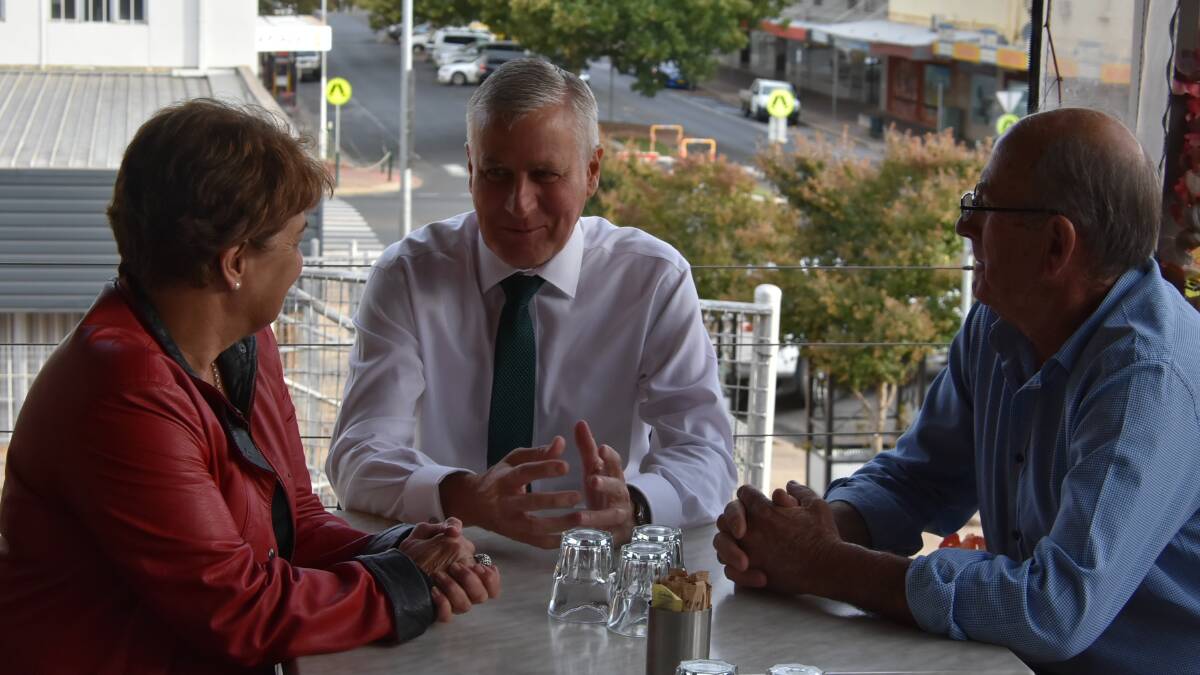 Member for Riverina Michael McCormack speaking with Cr Ruth Fagan and Mayor Bill West before his comments to Nationals members in Cowra.