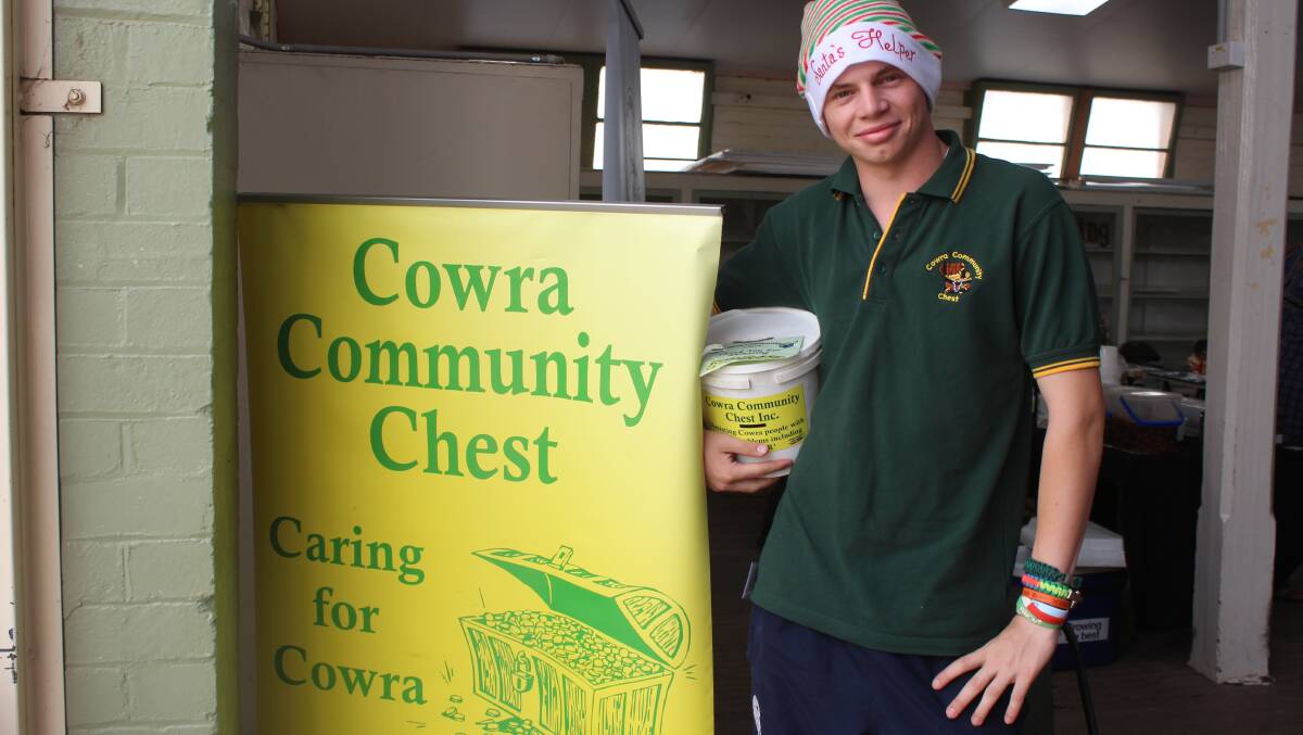 Cowra Community Chest volunteer Leo Wright welcomes shoppers to the markets.