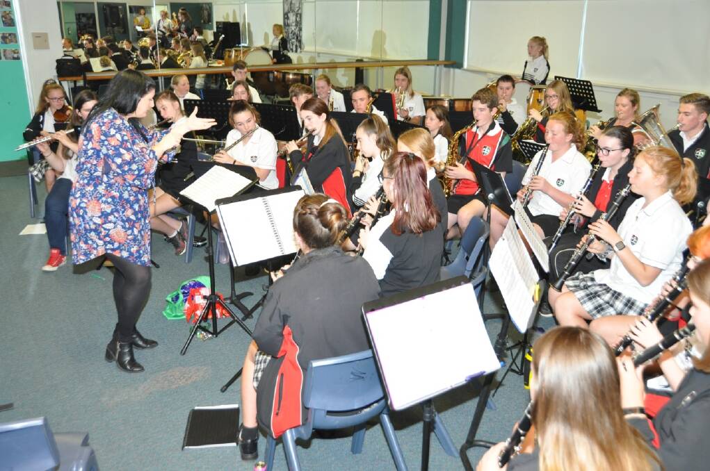 Dubbo College music coordinator Michelle O'Callaghan rehearsing with the concert band in preparation for the upcoming Canberra tour.