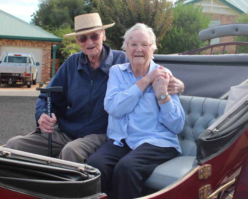 John and Jenny Hutchinson enjoy a special couples ride in the carriage.