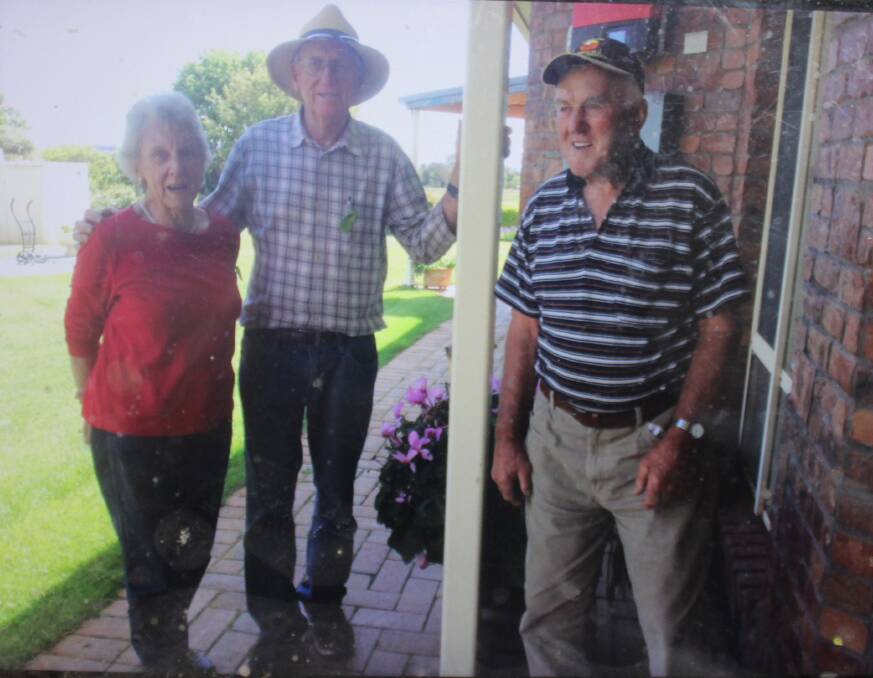 Pam and Peter Boler chat with garden owner Leon Bartholomaeus at his property on Darby's Falls Rd during the Cowra Open Gardens weekend. 
