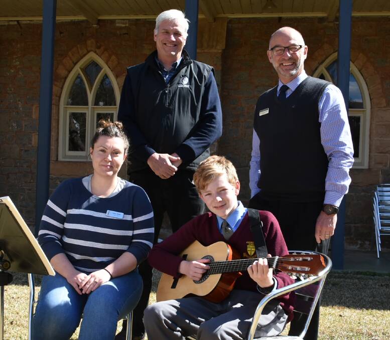 Young Regional School of Music CEO Matt Bolger, St Raphael's Principal Michael Gallagher with School of Music teacher Lisa Kenny and one of her many students.