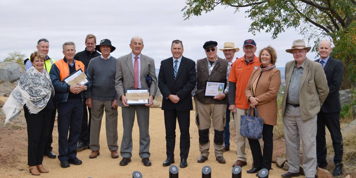Representatives of the committee, the Cowra Services Club, the Cowra Men’s Shed, Councillors and Council staff unveil the initial stages.