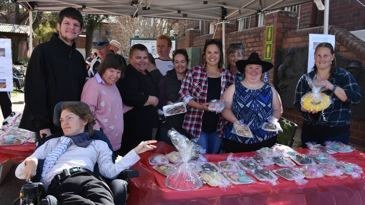 Cowra Special Needs staff and clients during their fundraising bake sale.