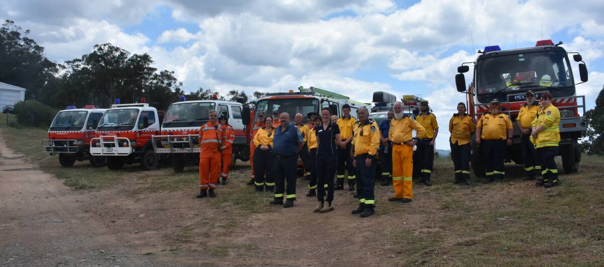 The Mt McDonald, Woodstock, Lyndhurst and Gap RFS brigades alongside Cowra SES prior to the start of the exercise. 