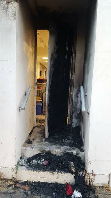 The door was left with minor smoke and fire damage.