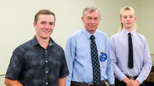 The 2020 Henley Trust Scholarship award winners Brian McCabe and Thomas Treasure with Rotary member Bob Griffiths. 