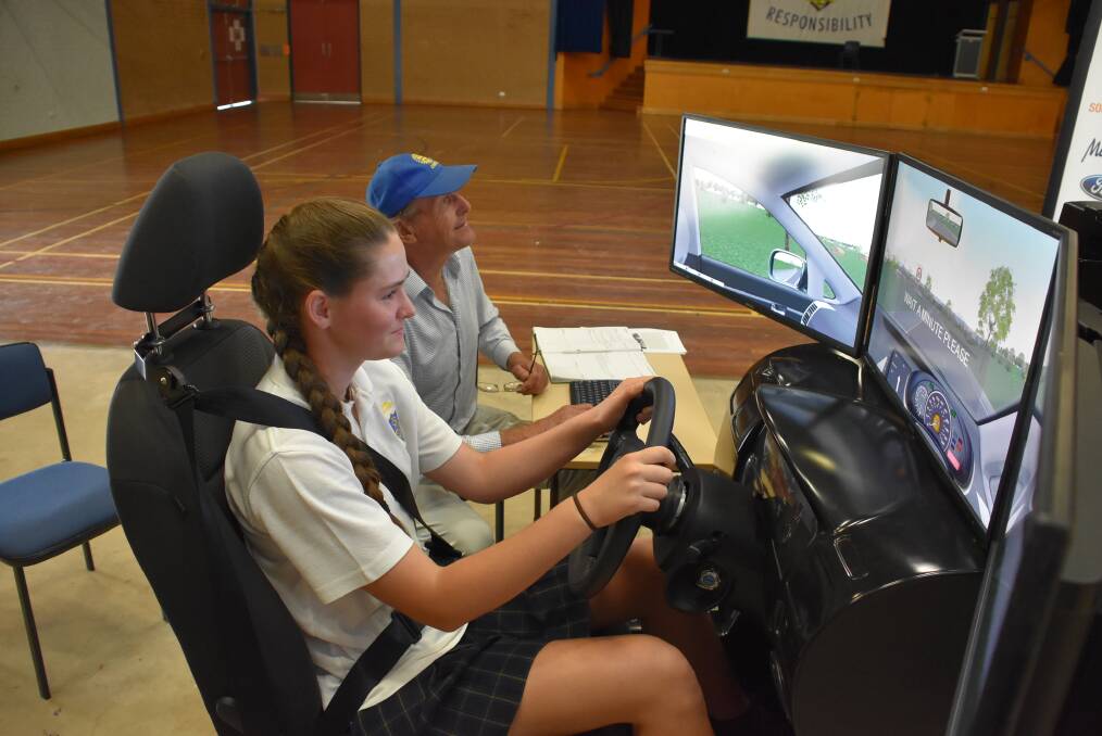  Nicole Lowe-Tarbert gets the simulation under way. During her time in the simulator she drove while distracted and while "under the influence".