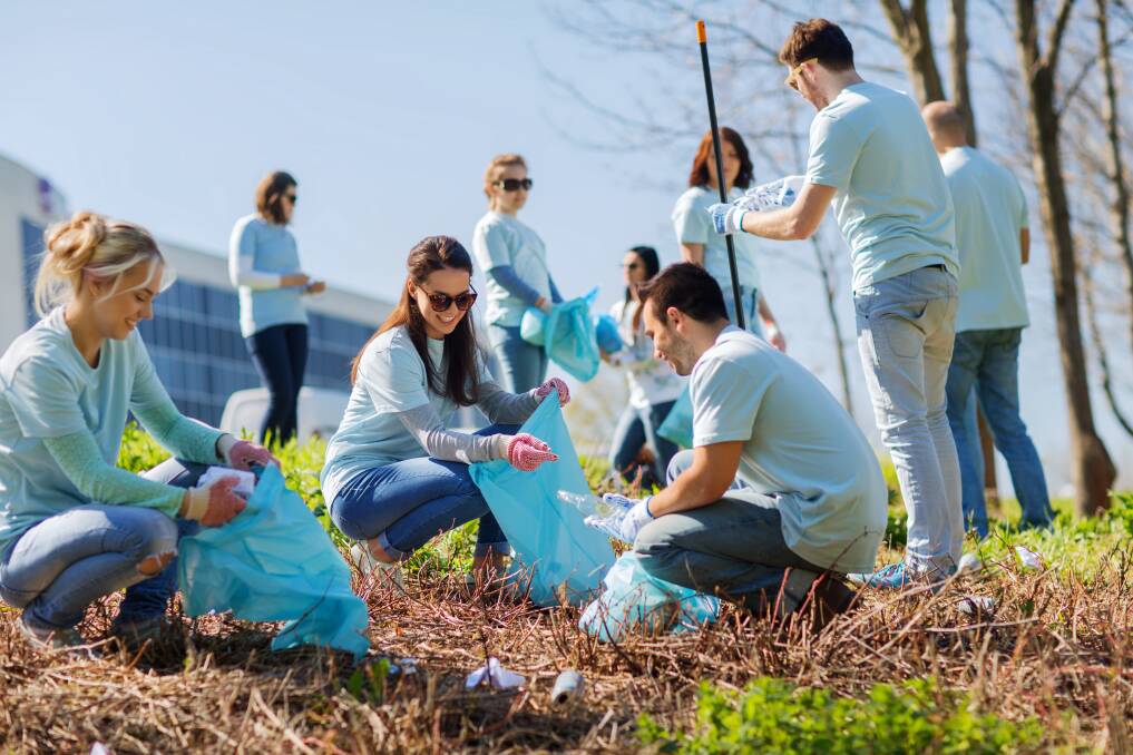 Helping hand: Events like 'Clean Up Australia Day' and 'Plant A Tree Day' can be great fun and are a great way to start making a difference. Photo: Shutterstock.