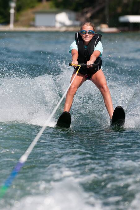 Exhilarating: Whether it is skiing, wake boarding or just riding on a ski biscuit, flying across the water at speed can be seriously fun. Photo: Shutterstock.