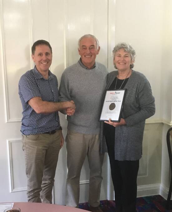 Deserving winners: Chairman of the Paint Right Group, Dale Goodacre, presenting Phill and Barbara Curtis with their "Store of the Year" award. Photo: Supplied.