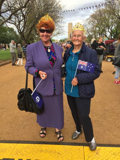 Valmai Wilson, left, and Thelma Boyd, from Binnaway waiting for Harry and Meghan, the Duke and Duchess of Sussex, at Victoria Park in Dubbo. Photo: Tim Barlass
