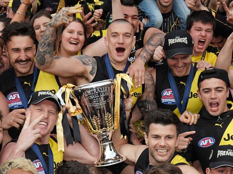 Dustin Martin (c) believes a third AFL flag in four years for Richmond would be just as special.