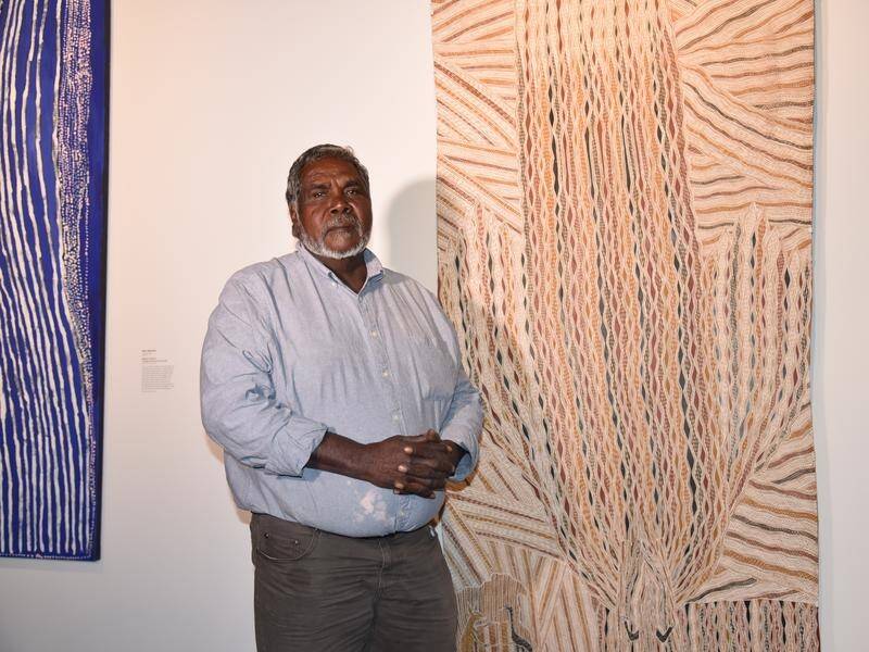 Arnhem Land Yolngu artist Djambawa Marawili is the winner of a prestigious indigenous art award.