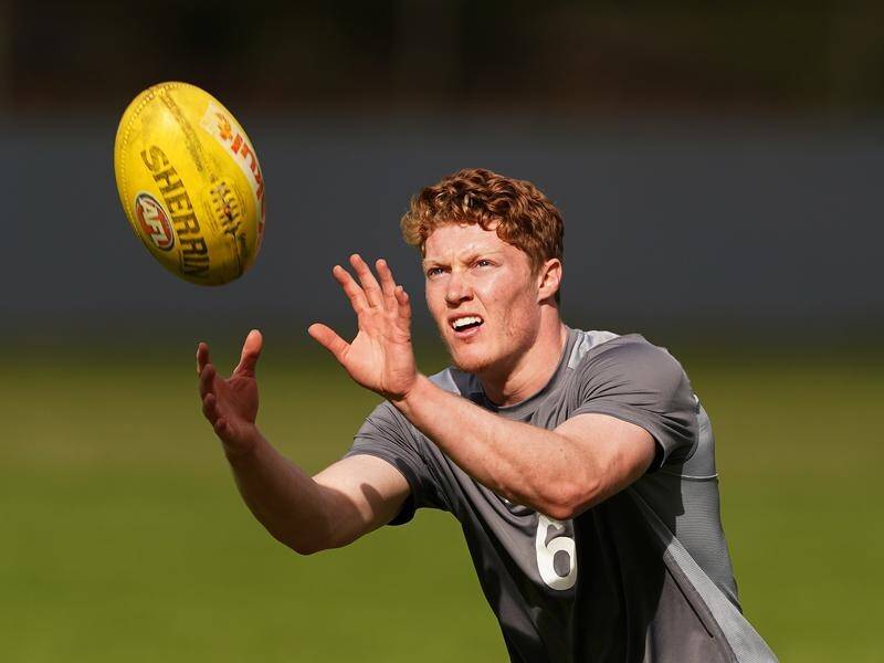 Gold Coast rookie Matt Rowell is set to measure himself against Geelong superstar Joel Selwood.