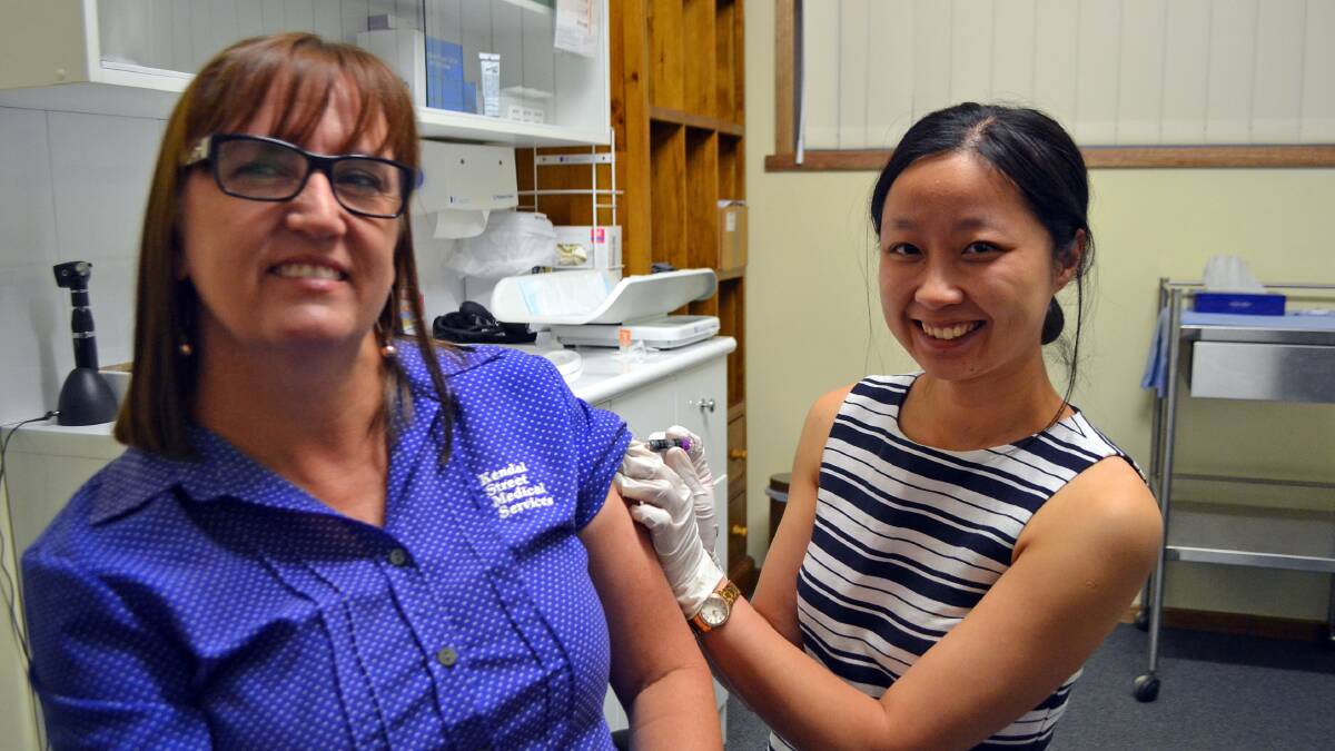 Sharon Downey from the Kendal St Medical Services with Dr Teena Downton getting a flu vaccination before the cooler months.