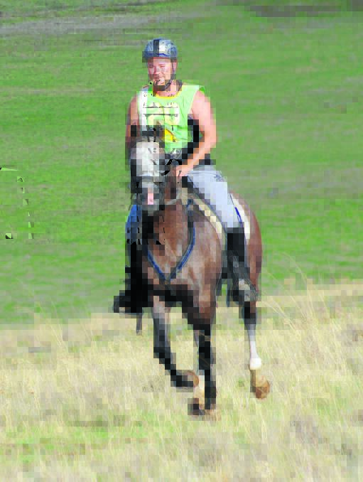 Mark Lindsay from Cowra riding Kintamani Silver Marksman. Photo: Animal Focus