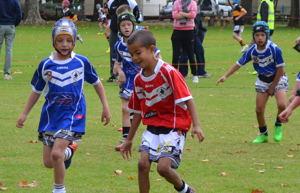 Left to right: Noah Knight, Thomas Pullen, Phil Ingram and Cameron Murray in under 8s junior rugby league action.