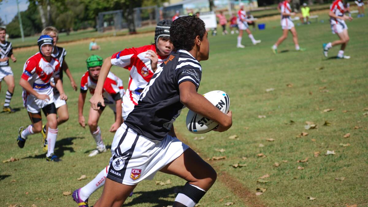 Jai Doolan, pictured making a break for Cowra last season, made selection into the Harold Matthews under 16s Canberra Raiders training sqaud. FILE PHOTO