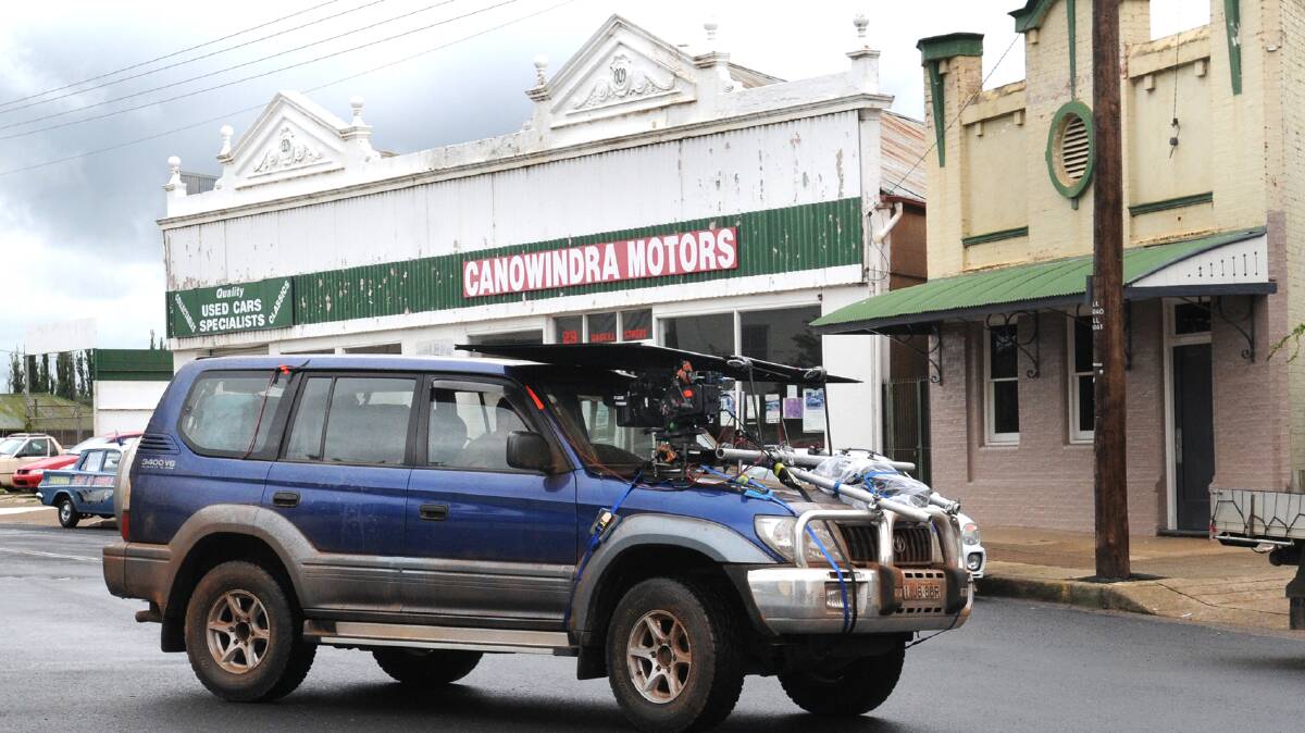Strangerland filming kicked off in Canowindra on Friday,with local landmark Canowindra Motors in the background. Photo Steve Gosch/CWD/Fairfax.