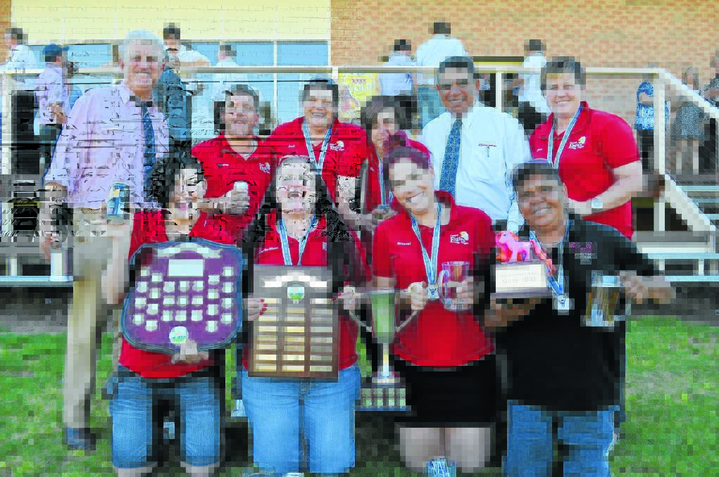 Members of the women's team and supporters celebrate their premiership victory and individual awards with Ash Webster (president) and Mark Ella.