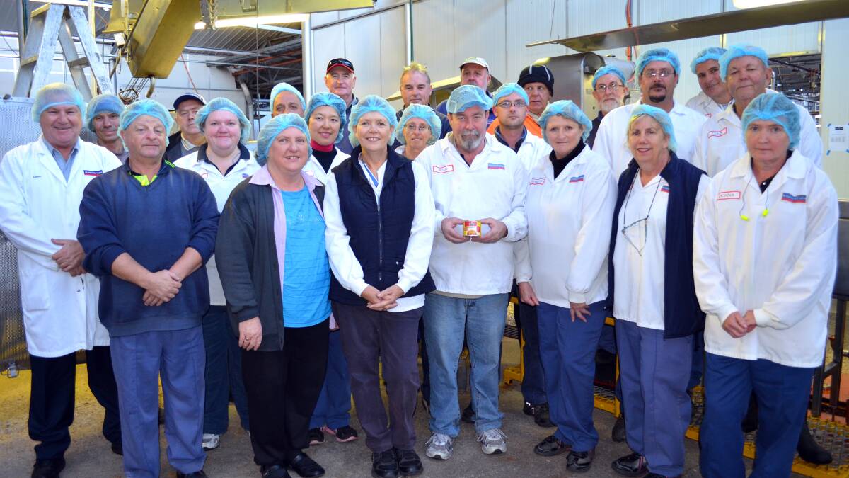 The last product to come off a production line at the Windsor Farm Foods Cowra cannery was this gluten free spaghetti for the Orgran label, held here by Brian Williams (centre). The owners of this label will have the product produced in the UK from now on. 