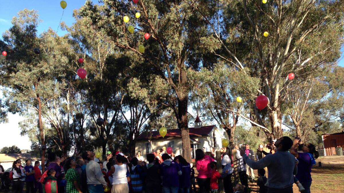 Balloons take to the sky above Erambie as part of Saturday's ten year anniversary memorial service for Kristy Lee Williams. 