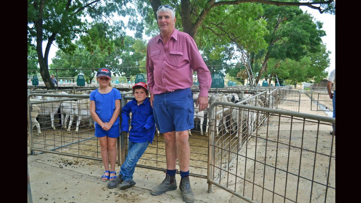 Annabelle and Charlie Sturgess of Koorawatha, enjoying a day out with pop, Stan Thistleton of Braidwood. 