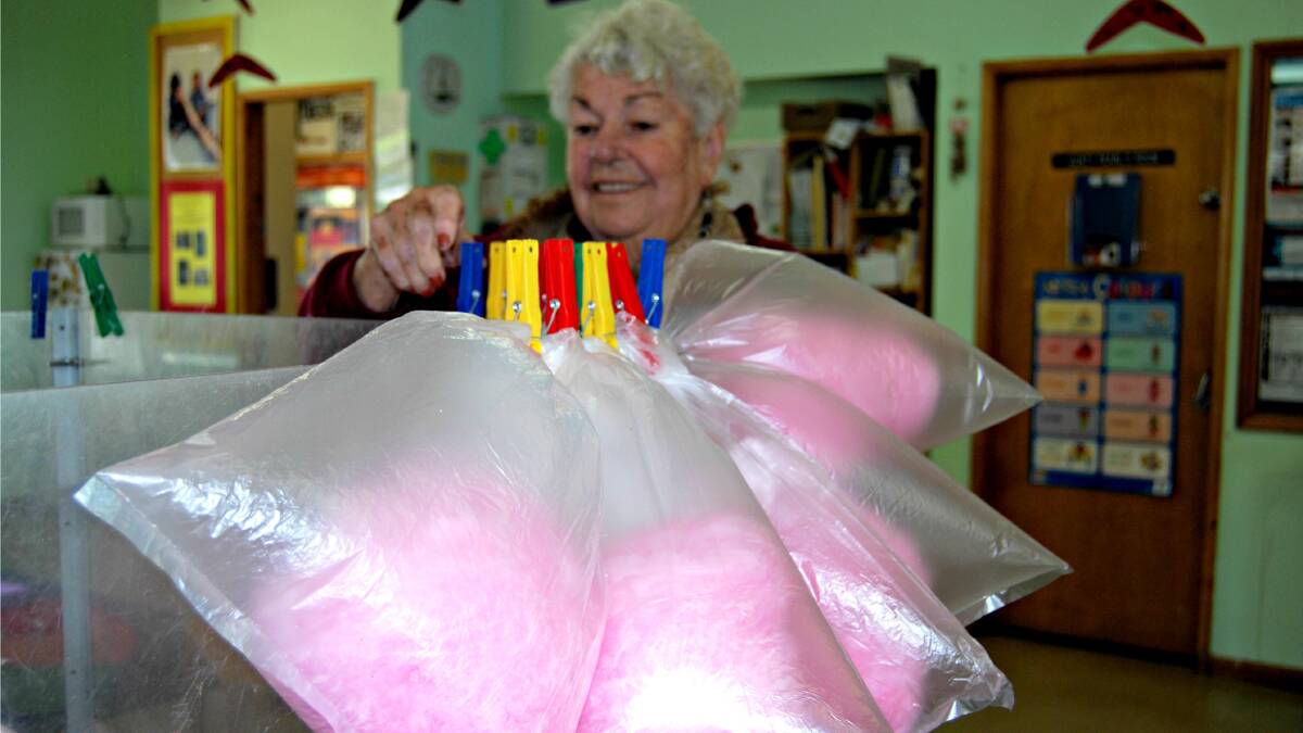 Anne Reaves hangs the fairy floss out to dry. 