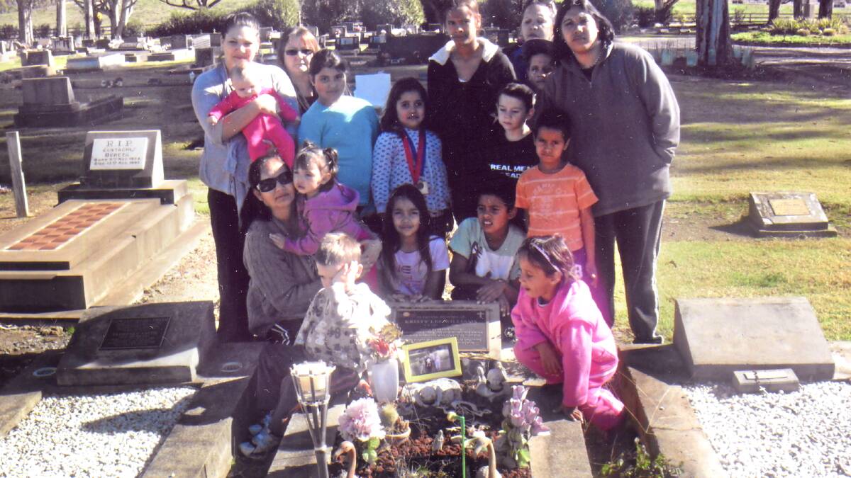 Family gathered at Kristy Lee Williams grave. It is now ten years since Kristy was killed. Photo provided by family.