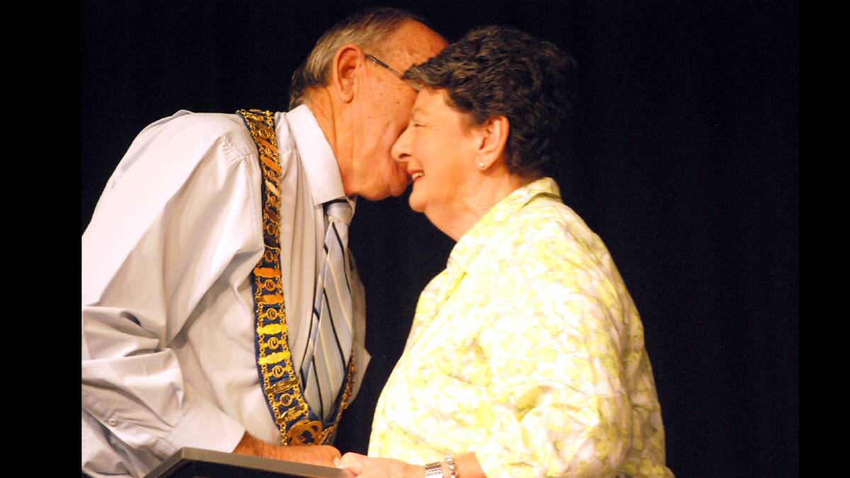 Cowra Mayor Bill West offers Citizen of the Year winner Barbara Newham his heartfelt congratulations. 